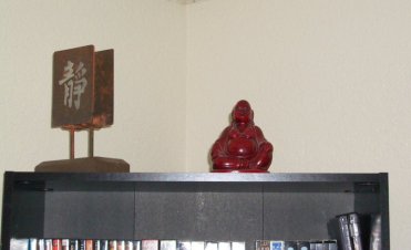 Buddha on the bookshelf